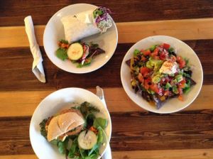 My Vegan grilled Portobello Sandwhich, Vegan Nachos, and a turkey wrap.  at Ginger's Garden Cafe in Springville