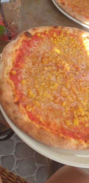 Vegan Margherita with corn at Pizzeria Portobello in Vienna