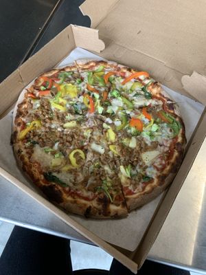 Thin crust but you’re able to ask for thicker at Create A Pizza in Rochester