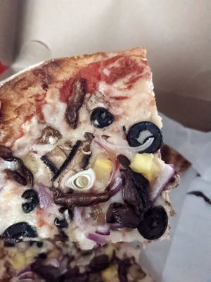 Pizza with nomu cheese at Create A Pizza in Rochester