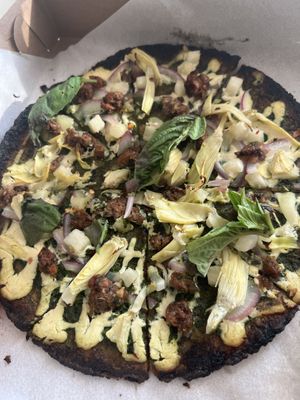 Vegan cauliflower crust, vegan ricotta, pesto, artichoke, vegan meatball, pineapple, red onion, basil  at Create A Pizza in Rochester