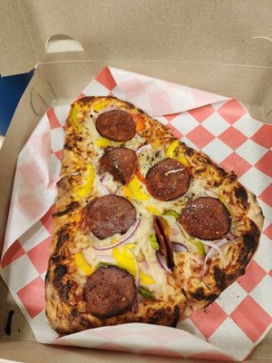 Personnel with grassfed pepperoni at Create A Pizza in Rochester