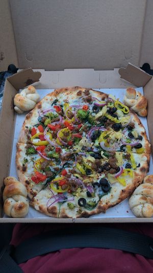 Cheap vegan garlic knots! Sweet! at Create A Pizza in Rochester