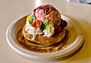 Donut with cheesecake and berry flavored ice cream at Scoop 'n Dough in Lisbon