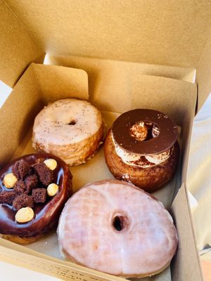 Lemon poppyseed,tiramisu, plain glazed, and hazelnut  at Scoop 'n Dough in Lisbon