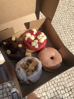 Was so glad to find this place. These Donuts were amazing, especially the one with raspberry. Worth it for the price   at Scoop 'n Dough in Lisbon