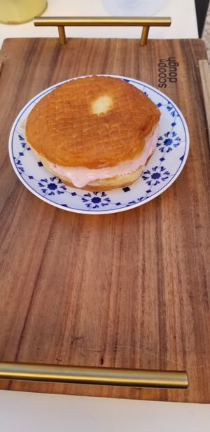 Doughnut made into an ice-cream sandwich! at Scoop 'n Dough in Lisbon