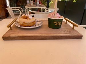 Ice cream with flavors "mango lassi" and "raspberry cheesecake" and a "banoffee pie" doughnut at Scoop 'n Dough in Lisbon
