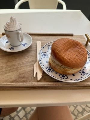 Ice cream dounut and coffee with chantilly  at Scoop 'n Dough in Lisbon