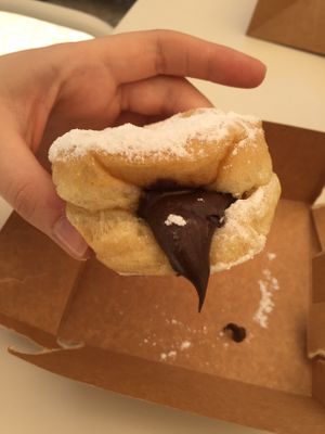 Chocolate filled vegan doughnut! 🍩🍫 at Scoop 'n Dough in Lisbon