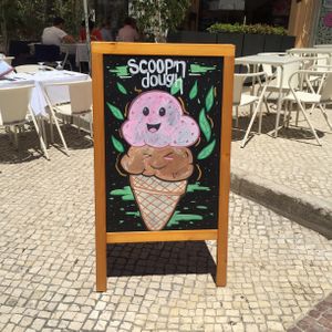 Cute sign outside! 💖 at Scoop 'n Dough in Lisbon