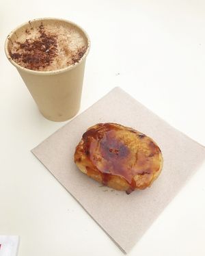 Caffè Latte + créme brûllée doughnut  at Scoop 'n Dough in Lisbon