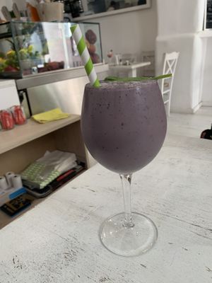 Vegan berry, spinach, almond milk smoothie - can be made vegan with grape honey  at Healthylicious in Mykonos