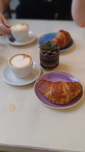 Soy cappuccino and vegan raspberry stuffed croissant  at Rosemary in Rome