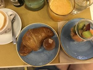 The vegan break: croissant, soy cappuccino & fruit. Does not include jam or orange juice.  at Rosemary in Rome