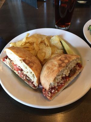 Vegan Veggieball Parmigiana with vegan RiNOTa cheese (made in-house) on homemade focaccia bread. at Pizza Luce in Eden Prairie