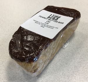 Vegan Chocolate Peanut Butter Bar ordered to go. Just ok. Chocolate had a stronger cacao taste than I'm used to. at Pizza Luce in Eden Prairie