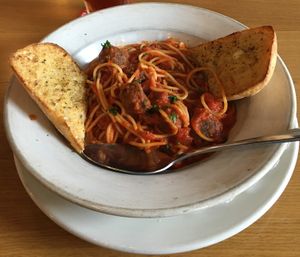 Vegan Traditional Spaghetti with homemade veggieballs and vegan garlic toast. Great Italian flavor that hits the spot. at Pizza Luce in Eden Prairie