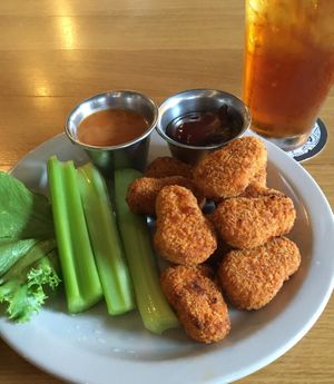 Vegan Lucky Bird Nuggets with vegan dipping sauces (sweet chili peanut & BBQ). Looks like a kid’s meal but is a tasty appetizer for all ages. at Pizza Luce in Eden Prairie