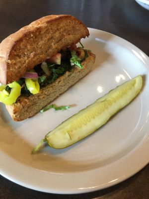 Part #1 of the Lunch Special (Half Hoagie + Salad): Ultimate Veggie Hoagie on homemade focaccia bread with RiNOTa vegan cheese. Tasty & a nice lunch portion size. at Pizza Luce in Eden Prairie