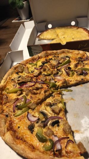 Vegan Peri Peri Lemon and Herb Pizza and a Vegan cheese garlic bread! at Pizzaholic in Newcastle Upon Tyne