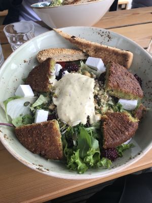 Salad with vegan feta and falafel  at Hans im Glück - Leopoldstr in Munich