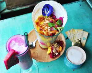 Breakfast set: Vegan smoothie bowl served with a fresh juice and a tea/coffee at The Spell Creperie in Ubud