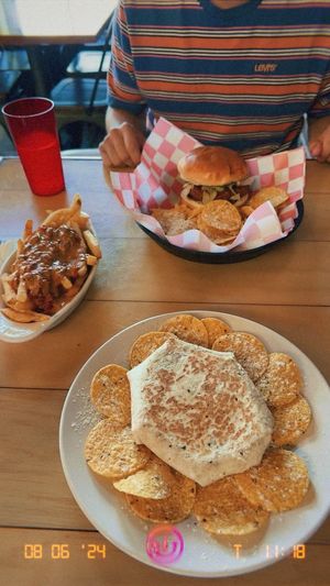 Buffalo chicken sandwich, chili cheese fries, Crunchwrap supreme, lemonade  at 10th Street Diner in Indianapolis