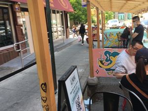 Outdoor seating (no tables, just seats) at Alimama Tea in New York City