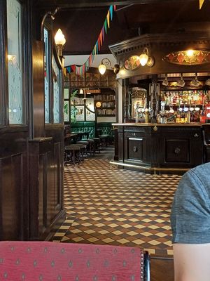 Cosy, railway waiting room themed interior at The Carriage in Newcastle Upon Tyne