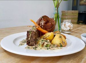 Vegetarian Roast, Vegan also available. Served with roast potatoes, Yorkshire pudding (vegetarian), seasonal vegetables, wild mushroom &
madeira sauce at Tremenheere Kitchen in Penzance