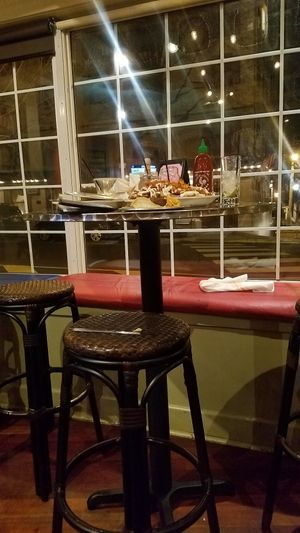 View of window seating at Mill Street Cantina in Bristol