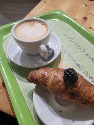 Vegan croissant with berry jam at Cooofe Bar in Barcelona