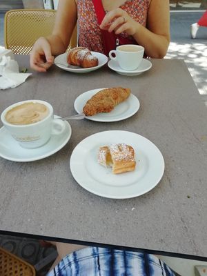 Vegan croissants (front 2) and coffee at Cooofe Bar in Barcelona