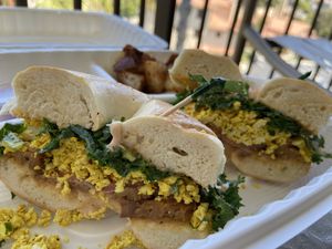 Egg and bacon bagel sub side of potatoes for fruit  at The Grain Cafe in Redondo Beach