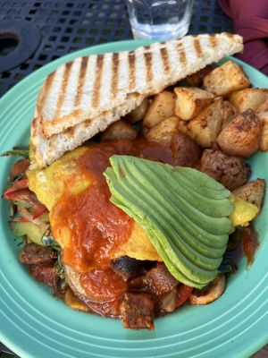 Omelette with added sausage   at The Grain Cafe in Redondo Beach