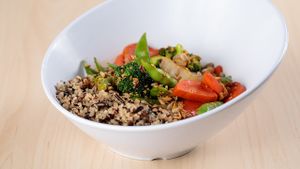 Vegan Fusion Bowl- rice & quinoa pilaf w/ assorted stir fried vegetables tossed in teriyaki sauce.  Or  there's a whole "build your own bowl" menu & all the sauces are vegan. at The Spoon in Provo