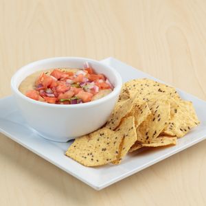 White Bean Queso Dip w/ Gluten Free seed based chips at The Spoon in Provo