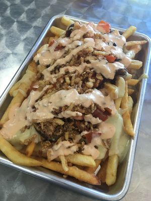 FRIED & GONE TO HEAVEN
Fries topped w/ creamy beer cheese, sweet & smoky shiitake onion jam, crispy onions, tomatoes & that not so secret sauce. at HeyO Eats in Mountain View