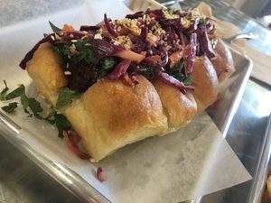 THAI CHILI BALLER
Crispy veg balls tossed in a sweet ginger chili glaze w/ kale, topped with slaw, & sprinkled w/ everything seasoning. at HeyO Eats in Mountain View