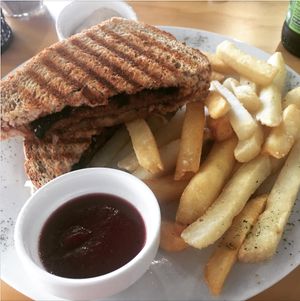 Steak and cheese sandwich with fries at Barley in Palmerston North