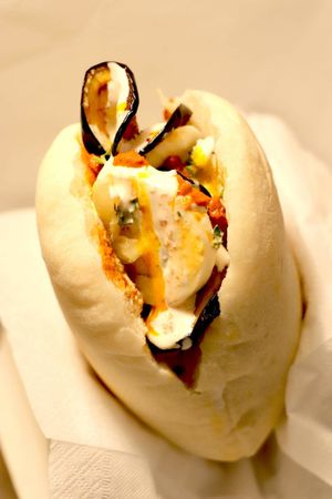 Sabich Sandwich - Pita bread stuffed with boiled egg, aubergine and fresh salad. Topping with your choice of sauce; hummus, tahini,chili, and Indian Mango.  at Aaida Falafel - MBK in Bangkok