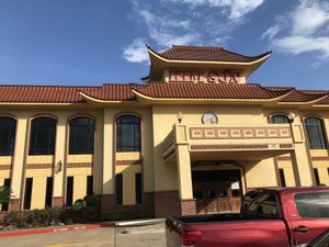 Outside with ample free parking in their own lot  at Kim Son in Houston