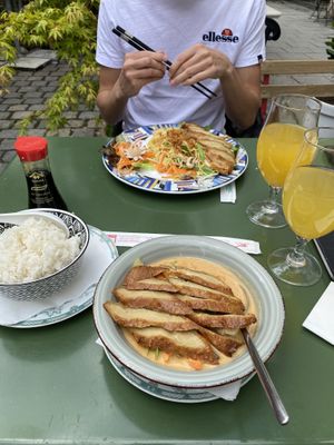 Vegan curry with mock duck and vegan fried noodles with mock duck  at Vegan Chay in Munich