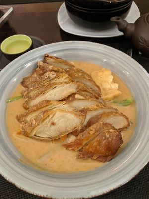 Peanut butter sauce with tofu and fake duck at Vegan Chay in Munich