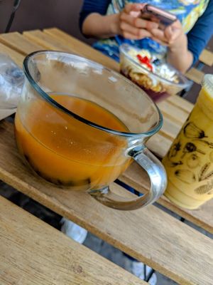 Pozole; also pictured is golden milk and acai bowl at JuiceUs in Brownsville