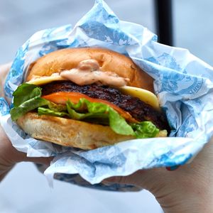 What the world needs now. A beetroot soya patty topped with burger sauce, Carolina mustard mayo, tomatoes, pickles and a slice of smoked gouda-style vegan cheese. at LEON - Temple Bar in Dublin