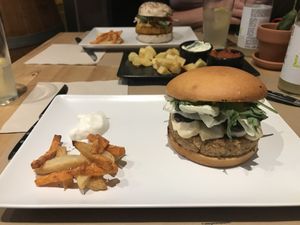 Burgers and patatas bravas at Melocotón Vegan Burger in Barcelona