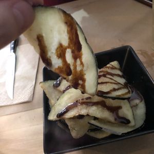 Fried aubergine with sugar cane  at Melocotón Vegan Burger in Barcelona