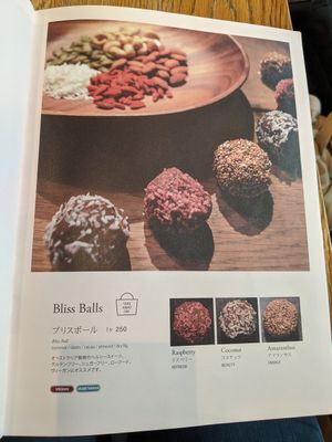 Menu page showing "bliss balls" at Latte Graphic in Tokyo